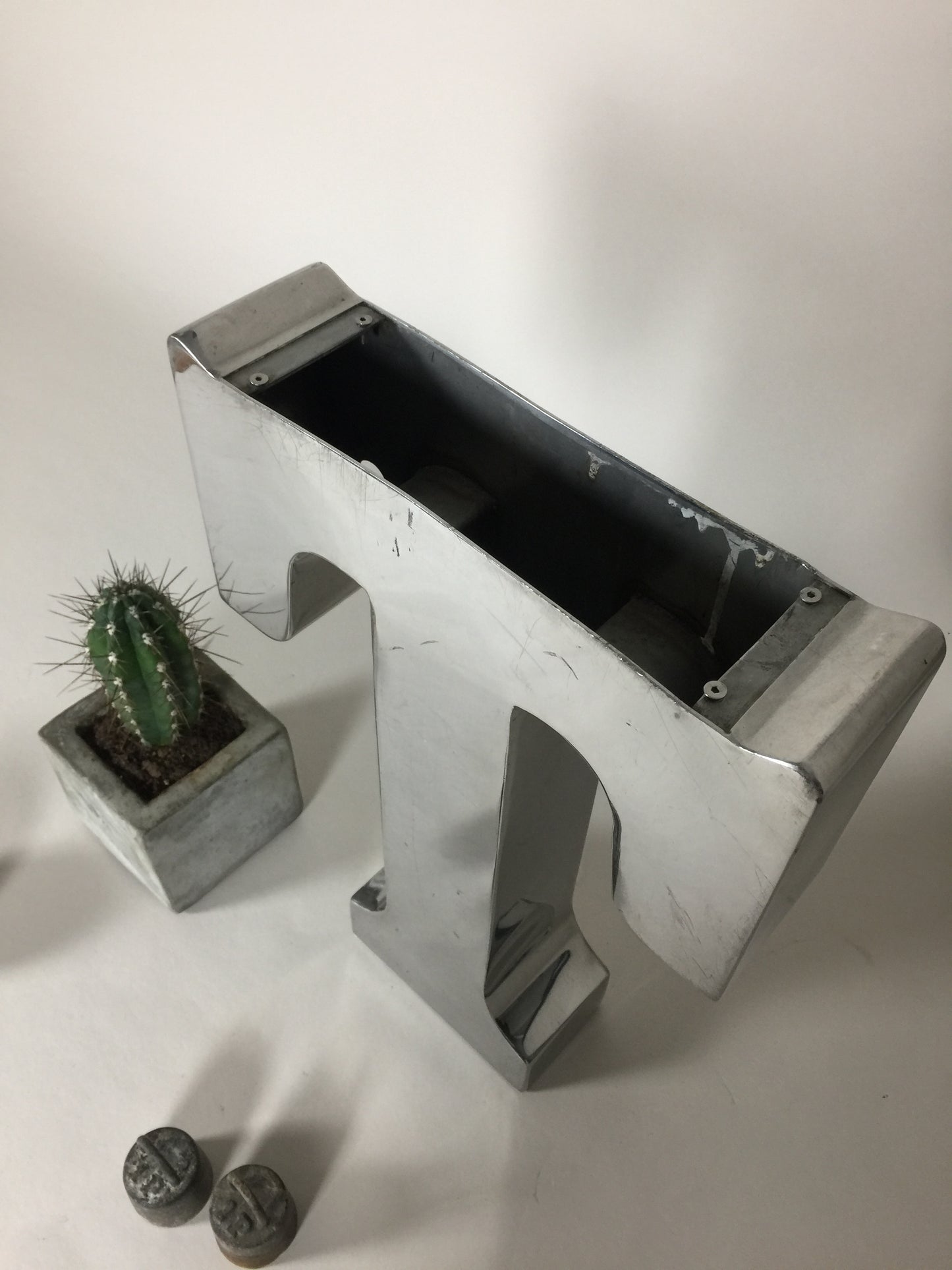 Buchstabe (Tuborg-Zeichen)