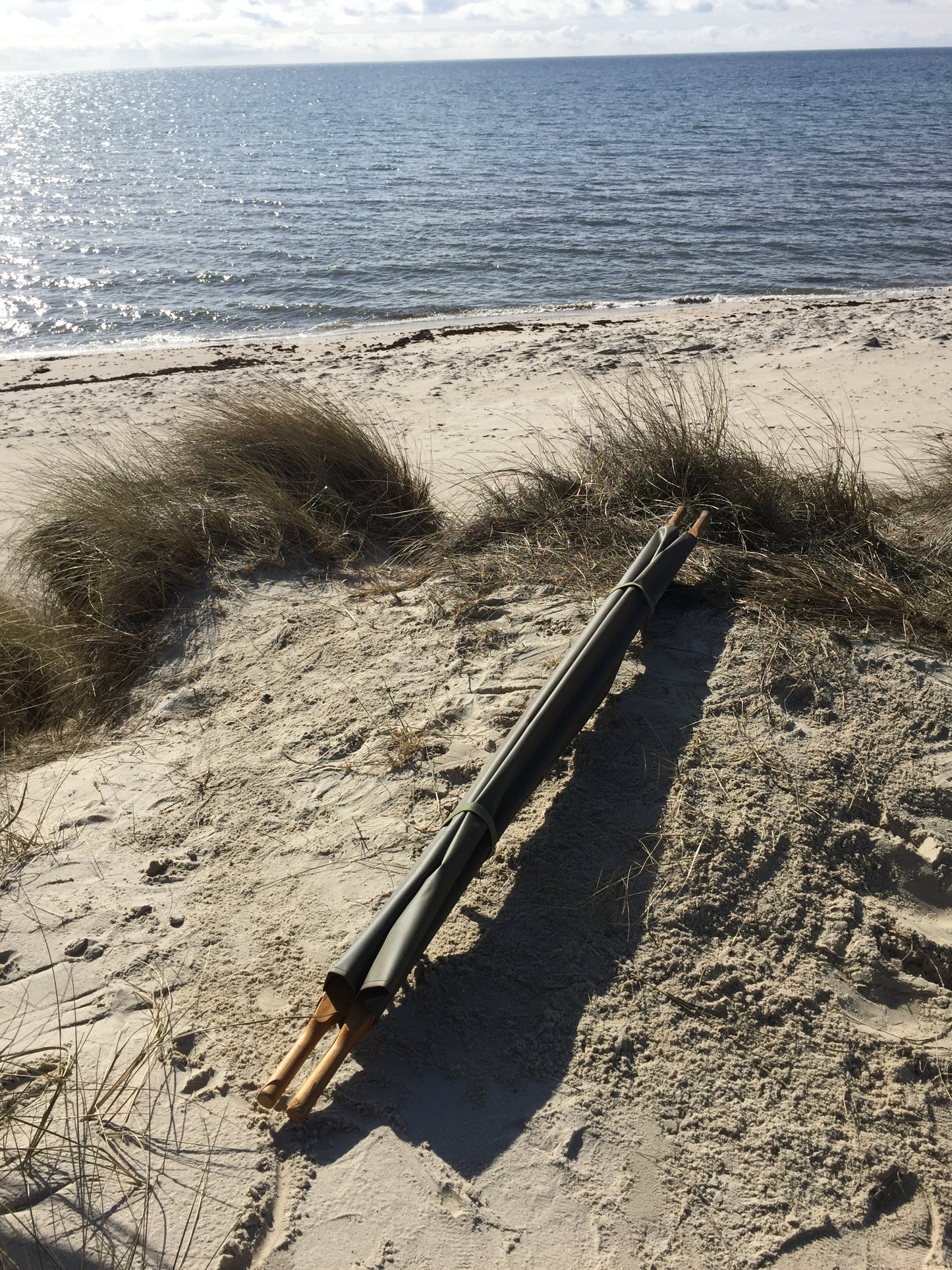 Lustige Trage mit Holzgriff und Metallbeinen