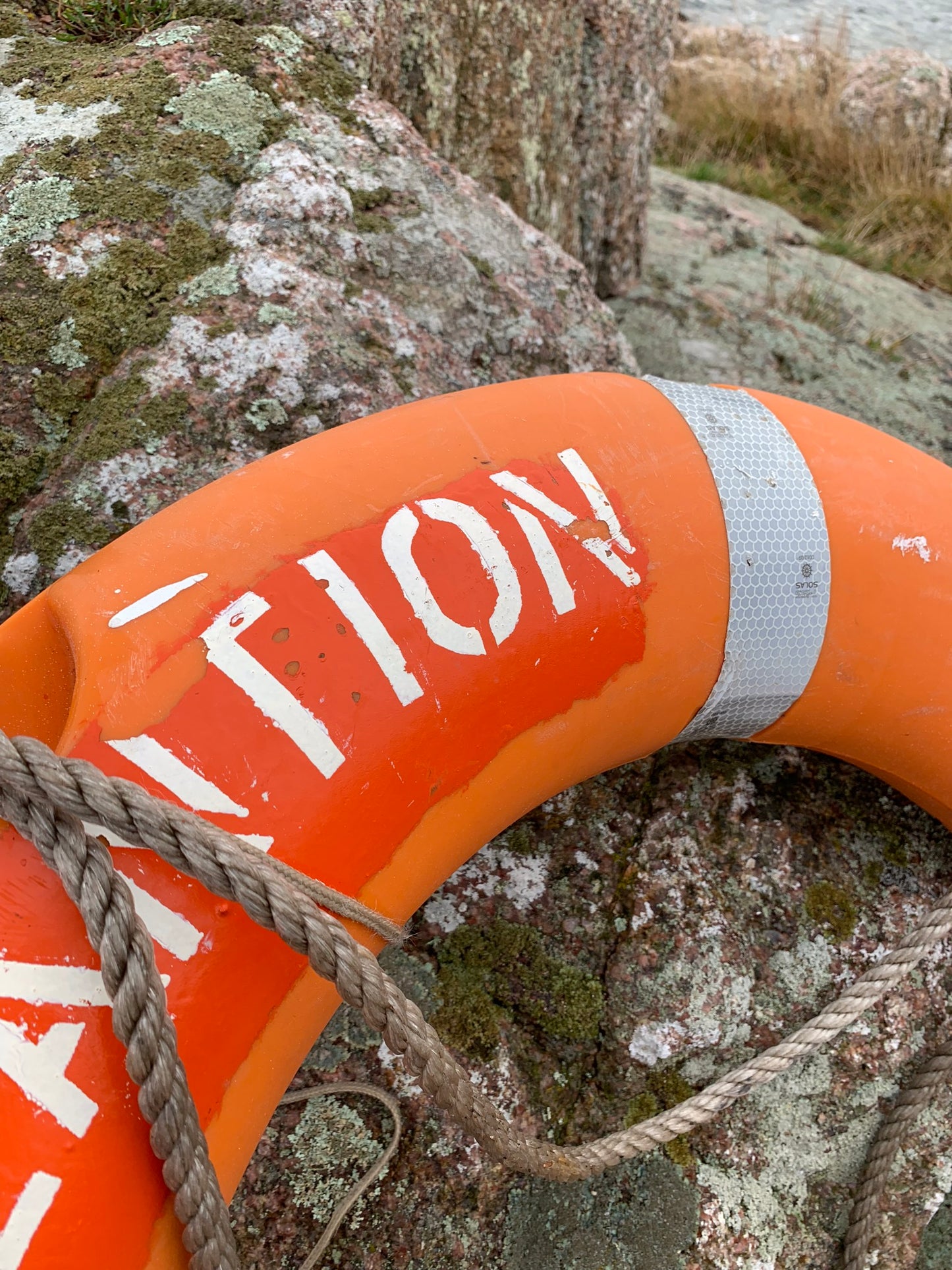 Rettungsring mit Schrift