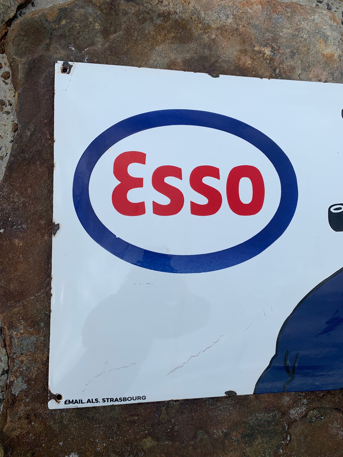 Emailleschild mit Kapitän Haddock und Esso