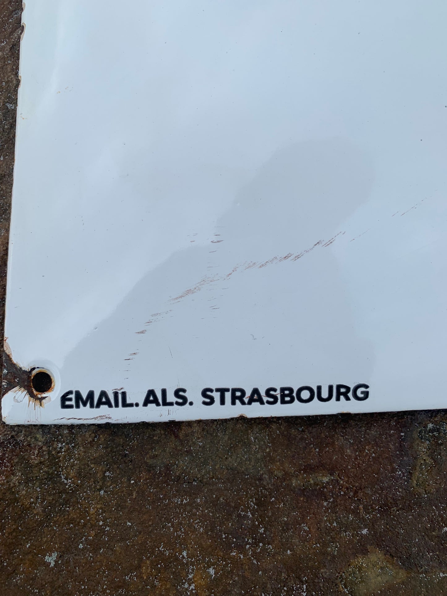 Emailleschild mit Kapitän Haddock und Esso