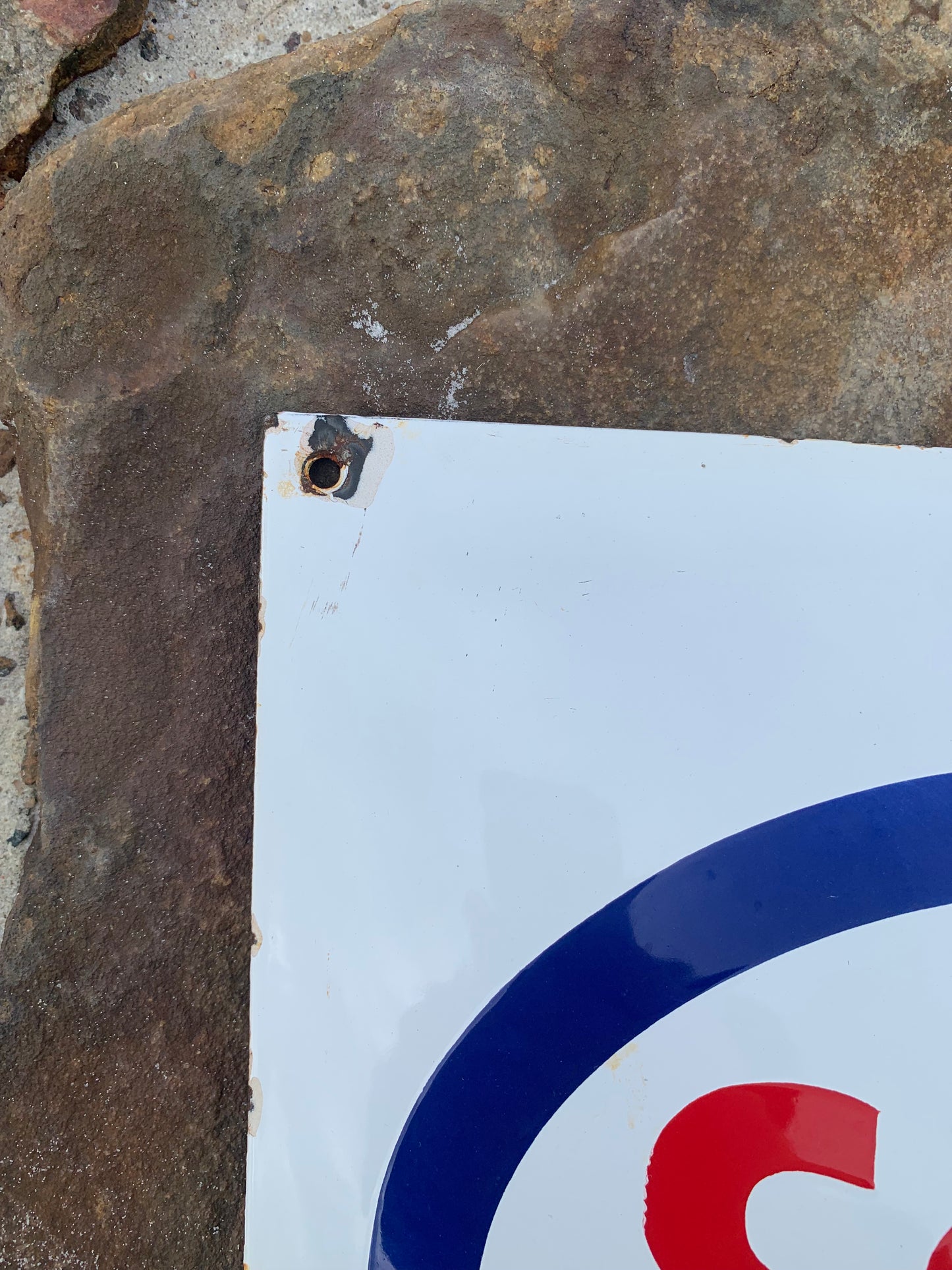 Emailleschild mit Kapitän Haddock und Esso