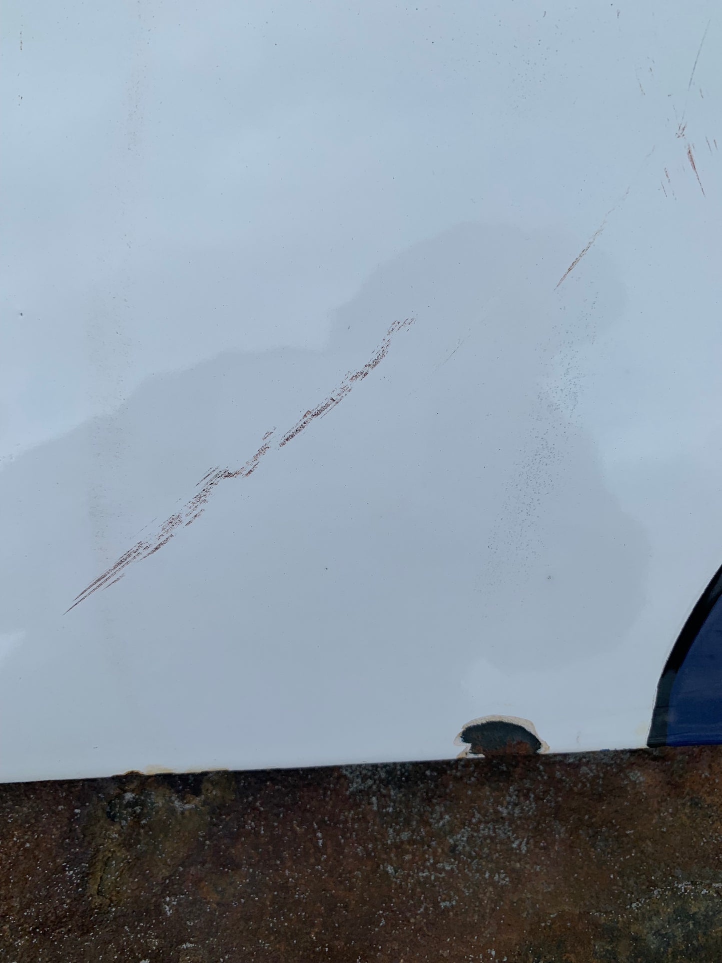 Emailleschild mit Kapitän Haddock und Esso