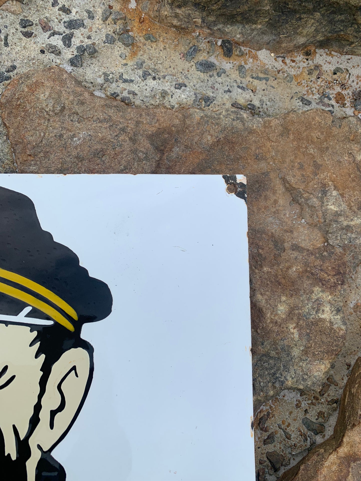 Emailleschild mit Kapitän Haddock und Esso