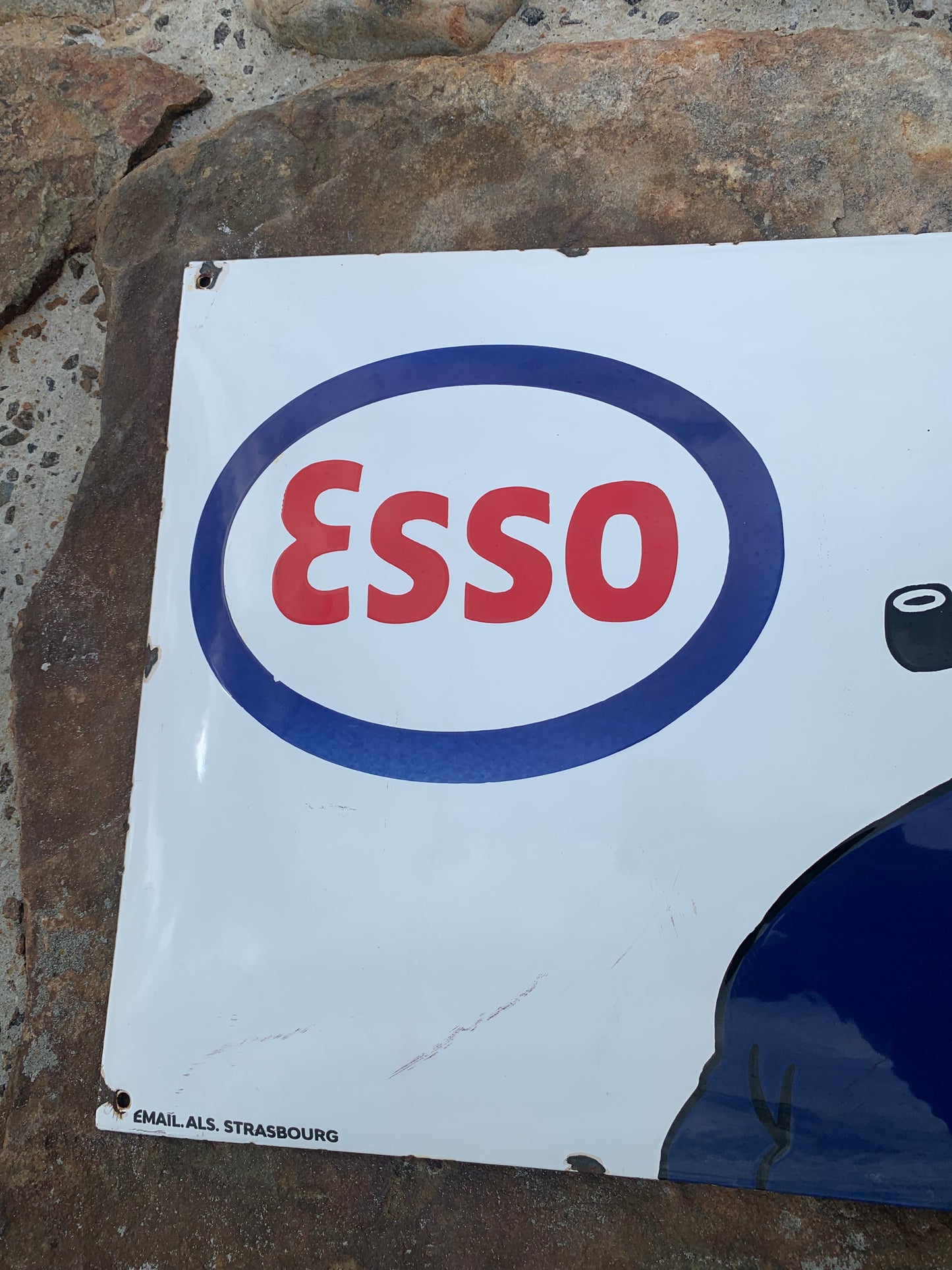 Emailleschild mit Kapitän Haddock und Esso