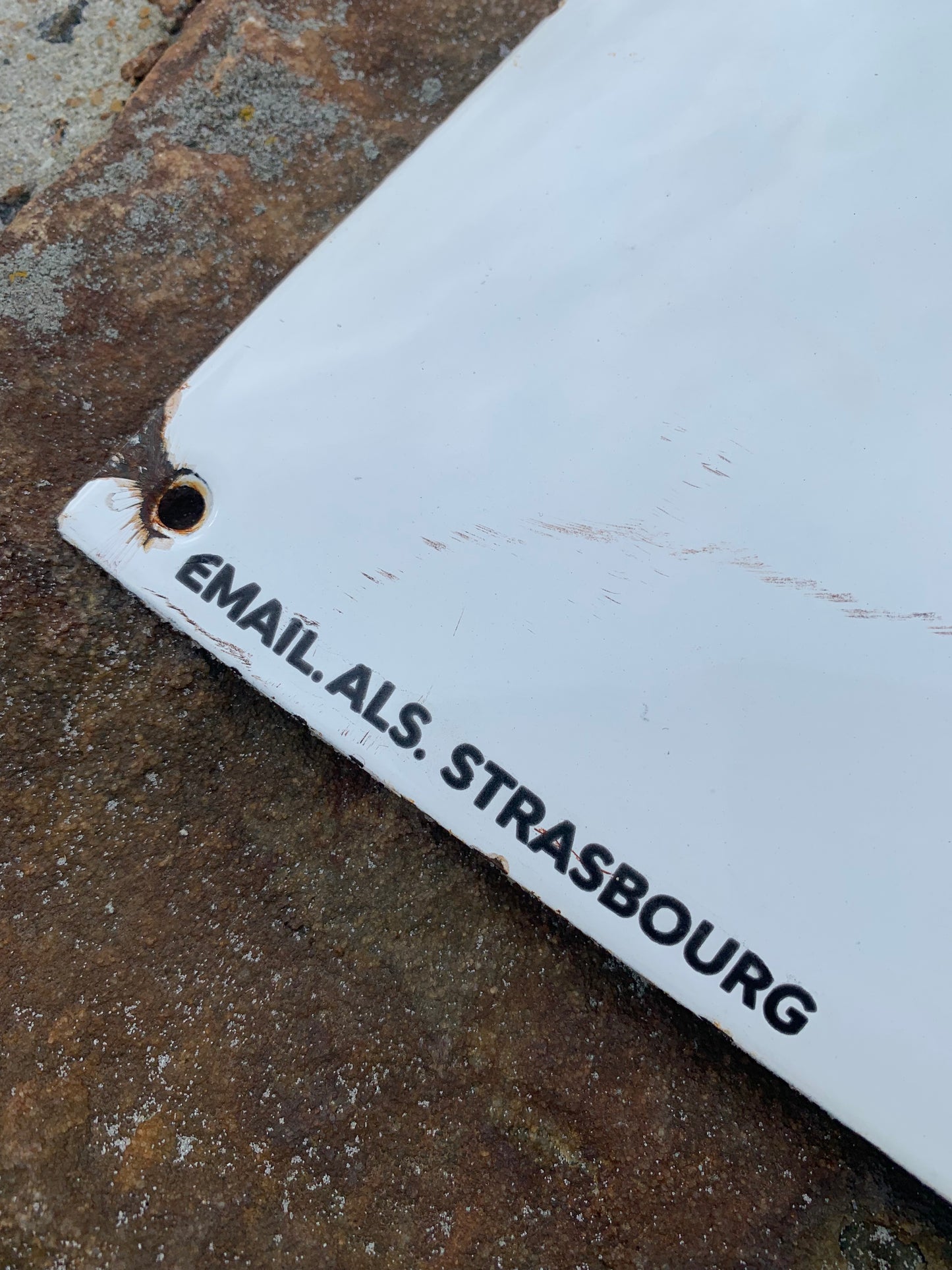 Emailleschild mit Kapitän Haddock und Esso