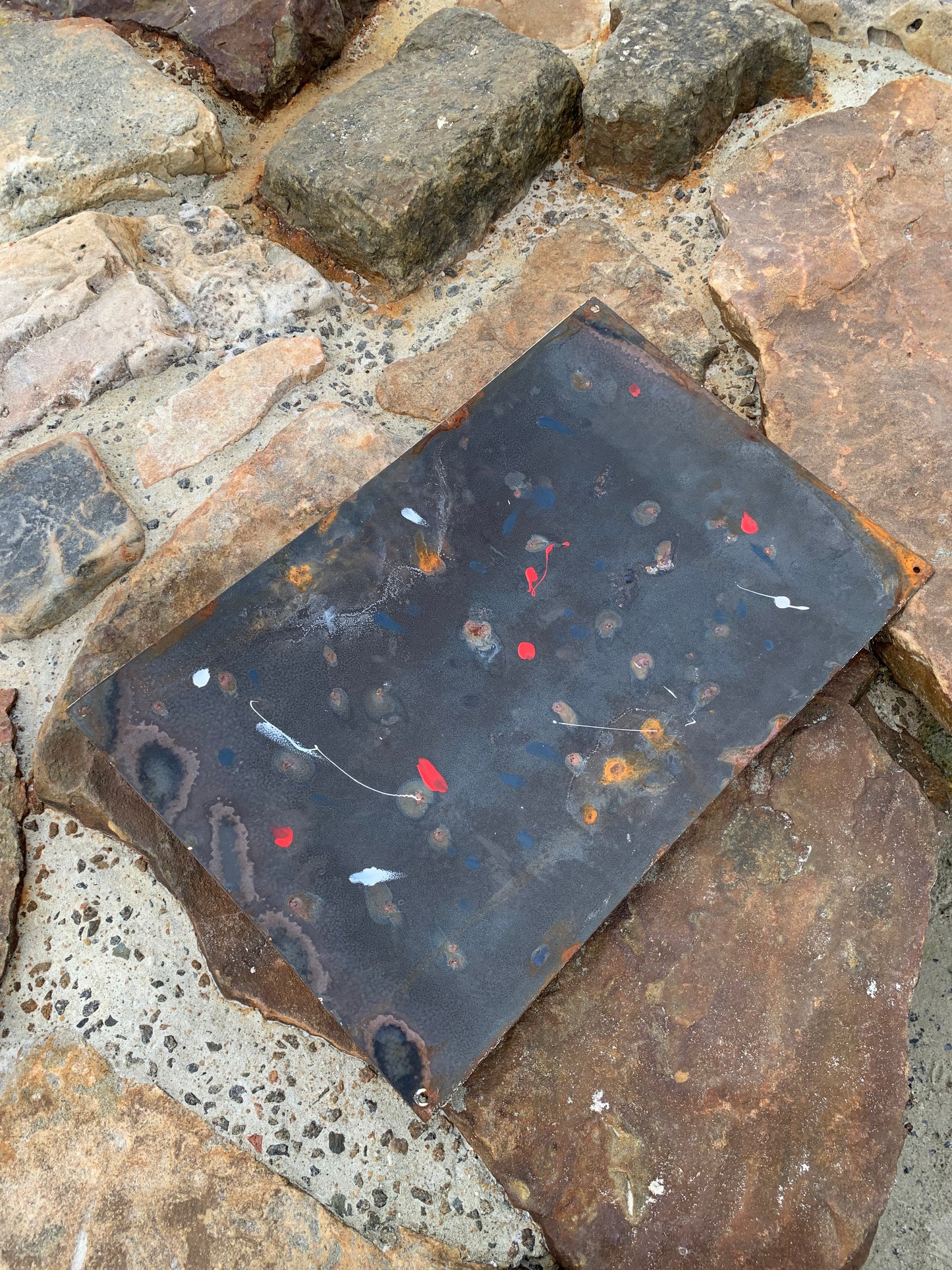 Emailleschild mit Kapitän Haddock und Esso