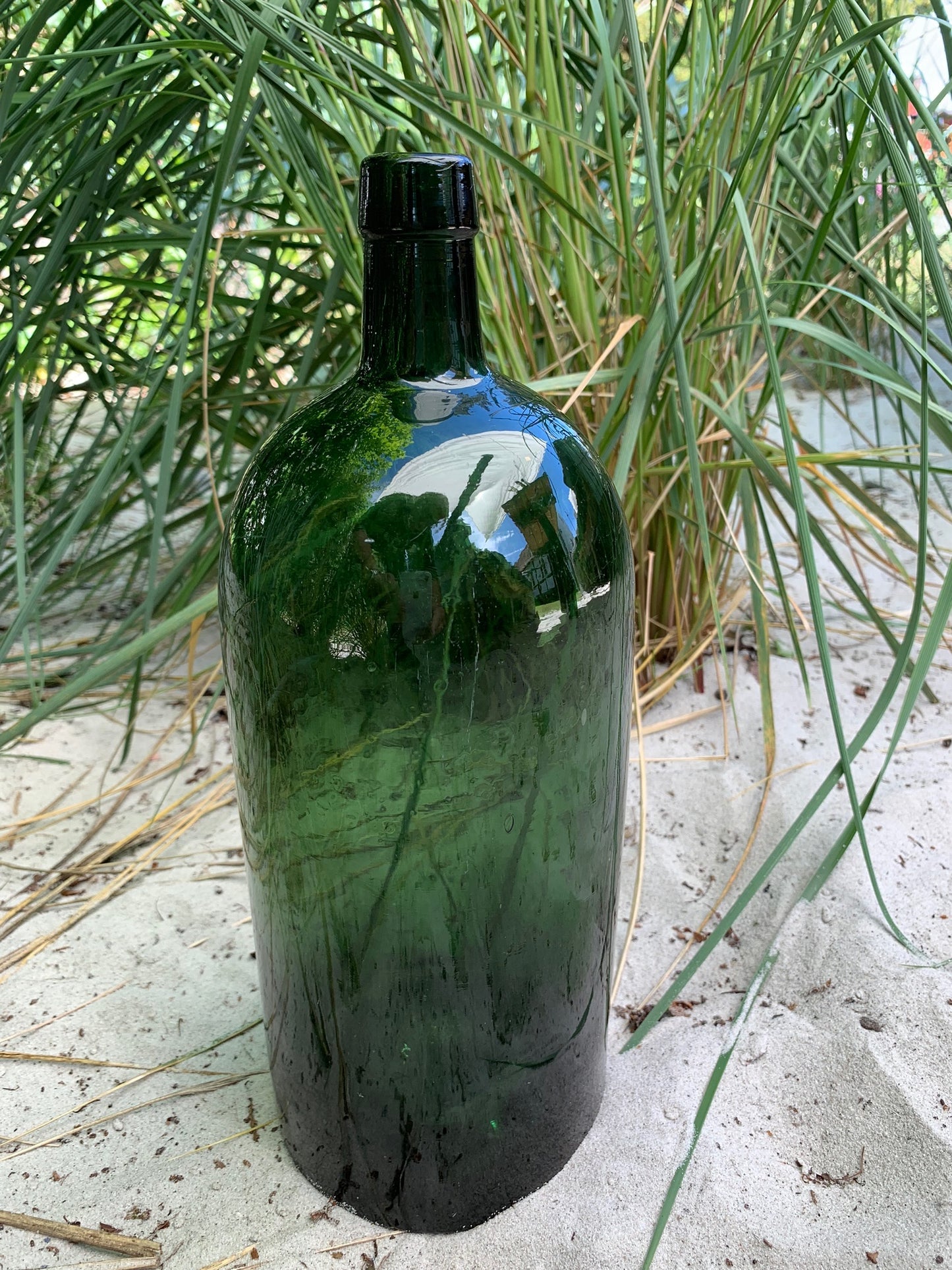 Große grüne Flasche