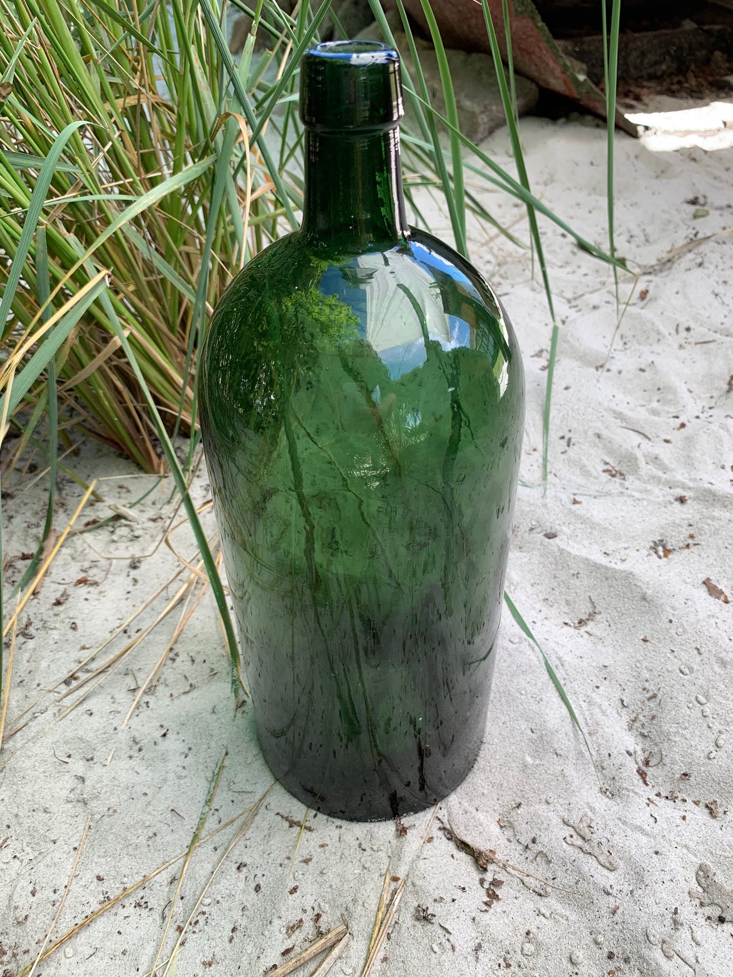 Große grüne Flasche