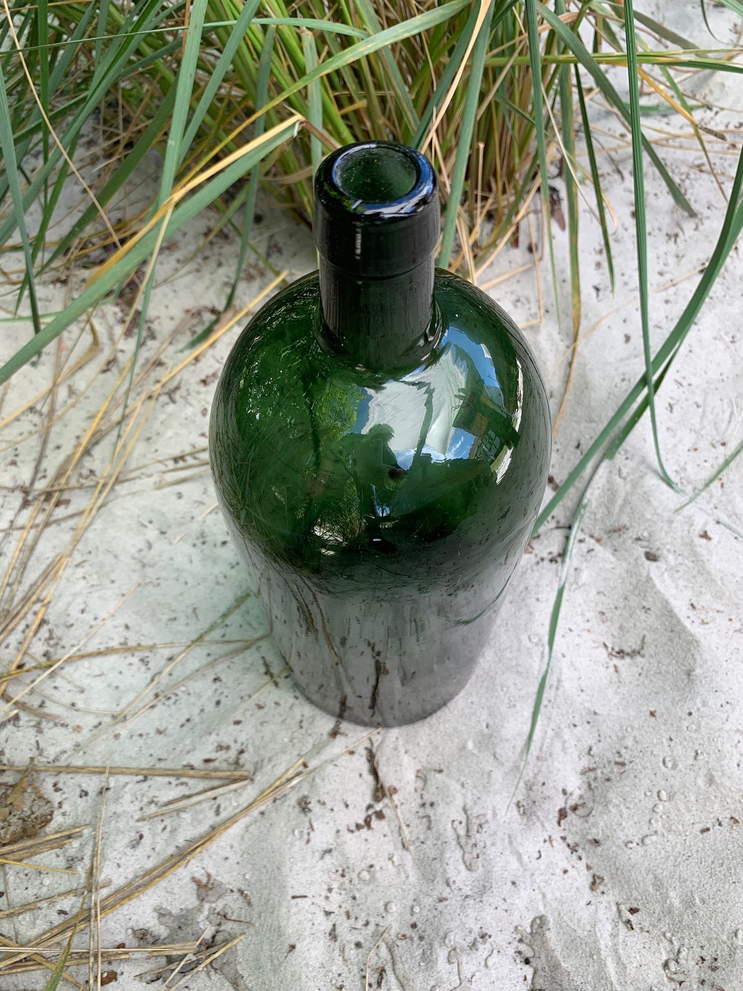 Große grüne Flasche